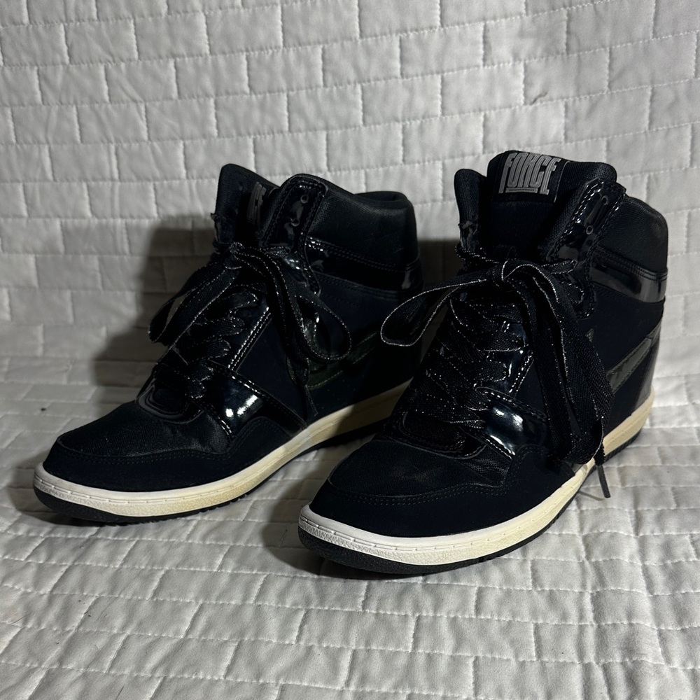 Nike Force Sky High women's hidden wedge sneaker in black and anthracite.